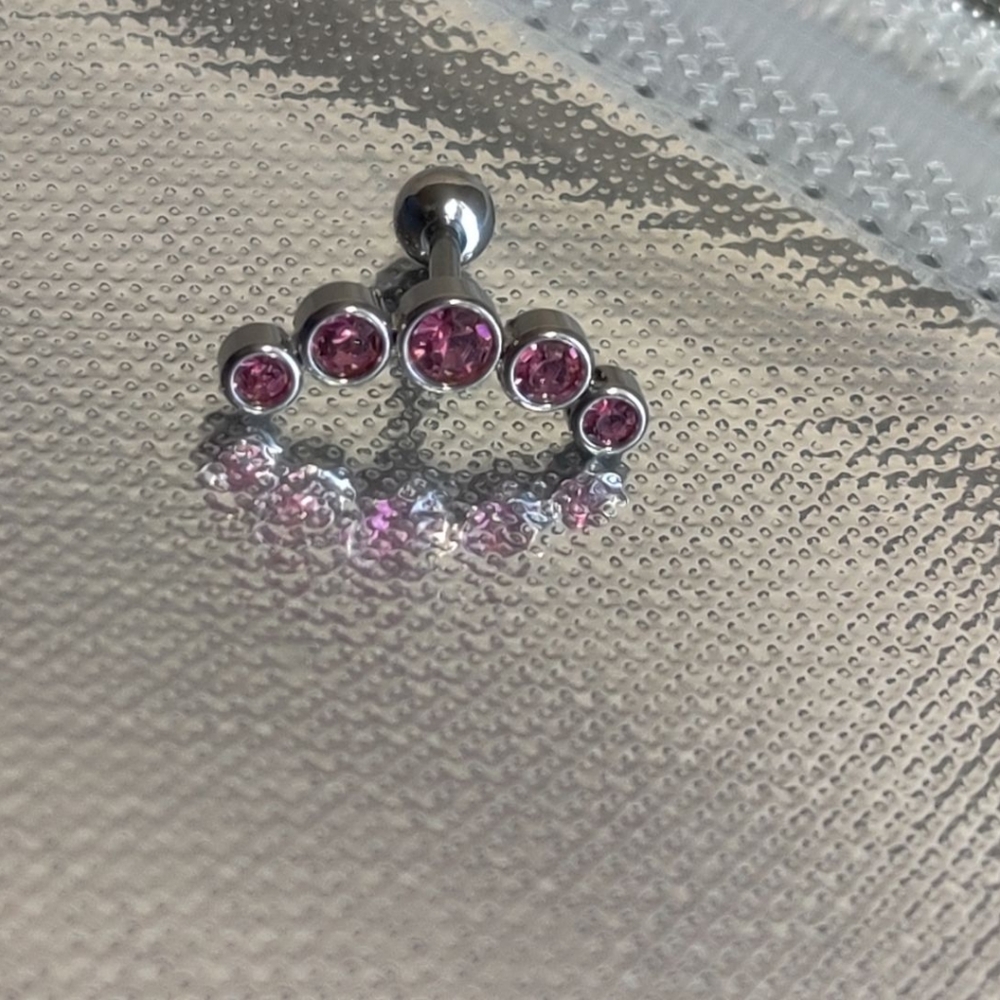 Ear cartilage piercing